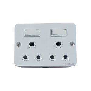 White wall-mounted multi-socket power adapter with two rocker switches and six circular outlets, brand Redis… on the corner