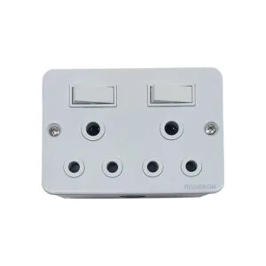 White wall-mounted multi-socket power adapter with two rocker switches and six circular outlets, brand Redis… on the corner