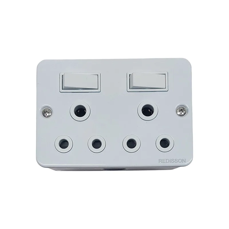 White wall-mounted multi-socket power adapter with two rocker switches and six circular outlets, brand Redis… on the corner