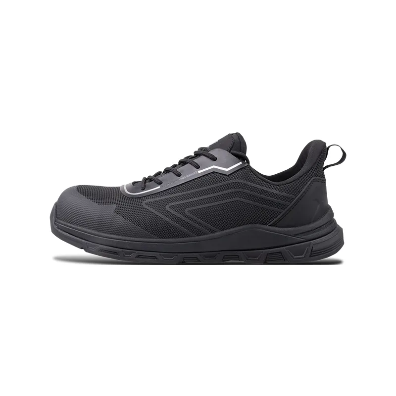 Side View of a Black Athletic Running Shoe with Gray Accents and a Pull Tab Shown on a White Background