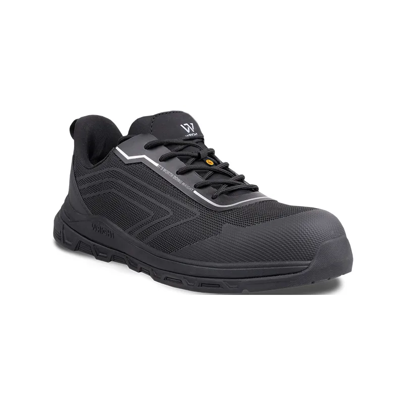 Black low-cut safety sneaker with reinforced toe, dark mesh upper and textured sides, lace-up design.