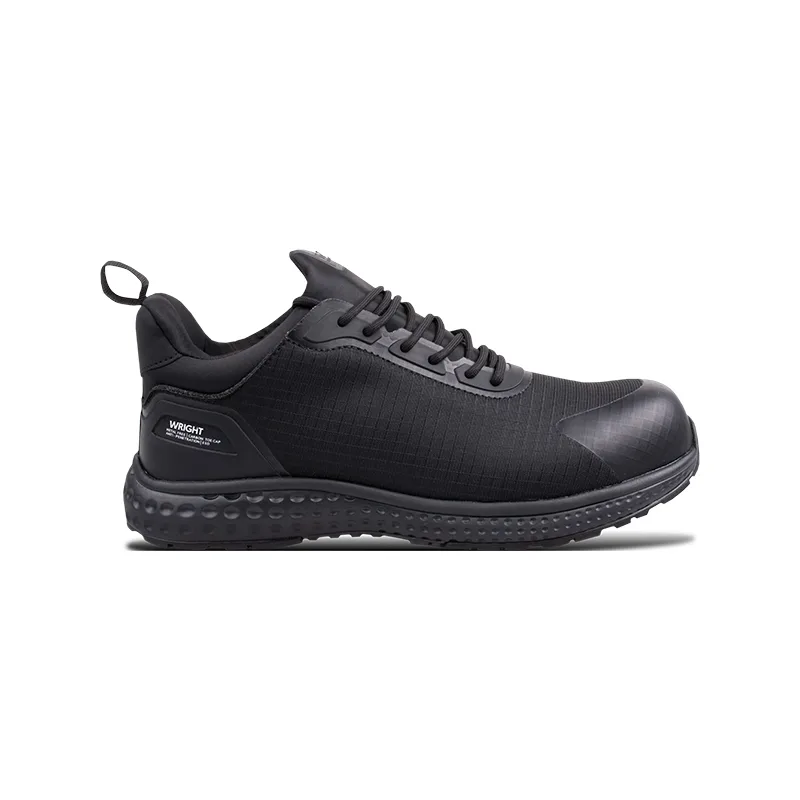 Black Wright brand Athletic Sneaker with Lace up Closure Low cut Profile and a Dotted Textured Midsole Viewed from the Side
