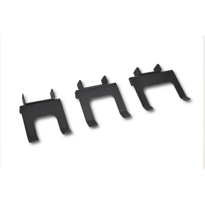 Three Black U shaped Mounting Clips with Small Hooks Arranged Diagonally