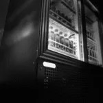 Staycold-ed-600x450 | Securadeal Glass door Beverage Cooler with Bottles Visible Inside Lit from the Back in a Dark Room