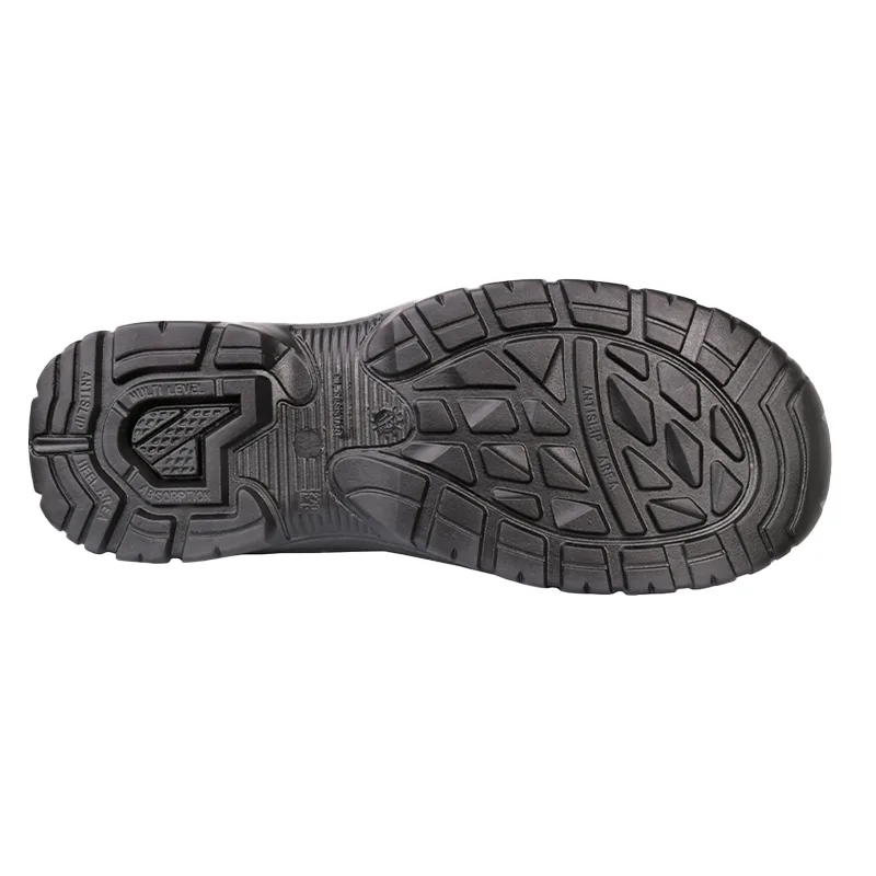 Bottom View of a Black Athletic Shoe Sole Showing Deep Tread and Multi directional Lugs