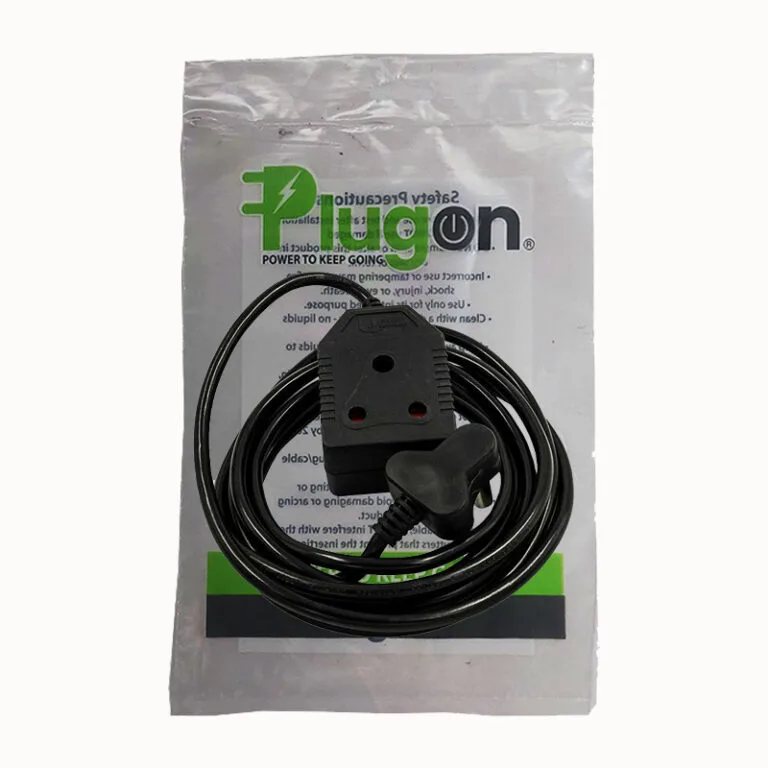 Coiled black electrical cord with a wall plug resting on a sealed plastic package labeled Plugon.