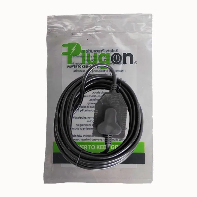 Coiled black power cable with a plug-in adapter resting on packaging labeled 'Power to keep going'.