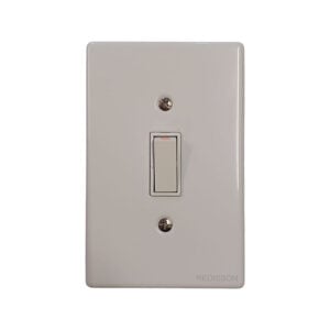 White single-gang wall light switch on a glossy rectangular plate