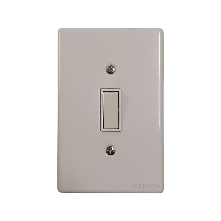 White single-gang wall light switch on a glossy rectangular plate
