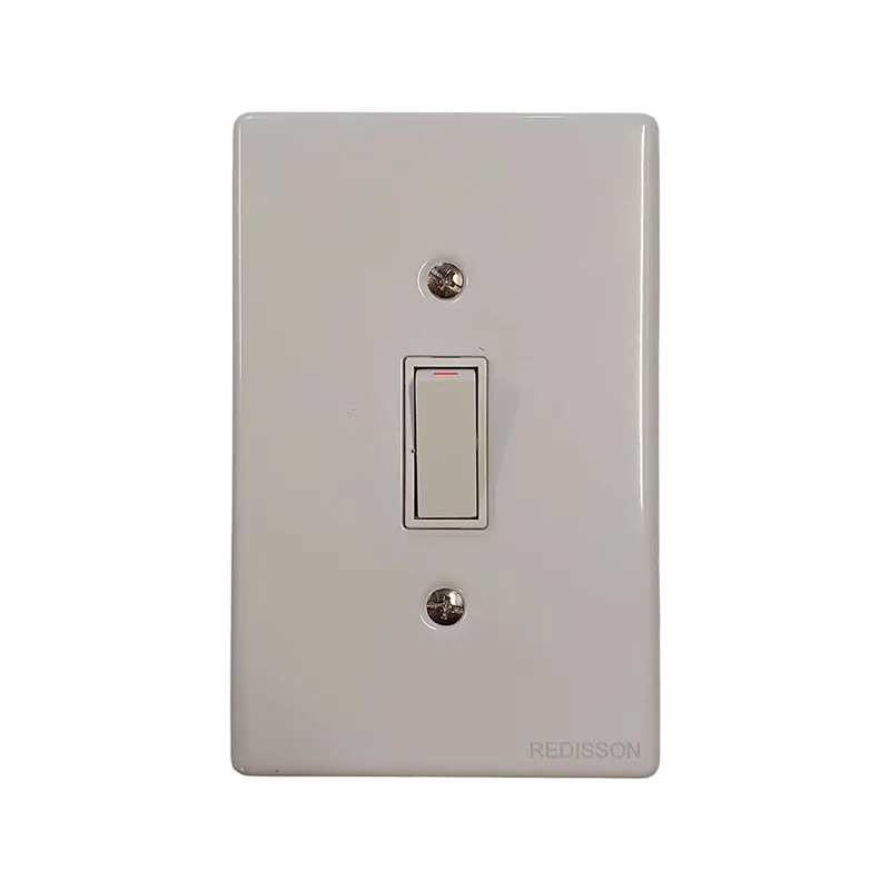 White single-gang wall light switch on a glossy rectangular plate