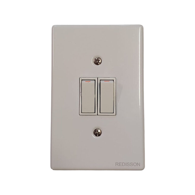 White double rocker light switch plate with two vertical switches on a wall plate