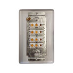 Back View of a White Modular Electrical Terminal Block with Multiple Gold screw Terminals Mounted on a Metal Plate Inside a White Wall Plate Cover