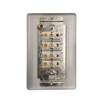 Back View of a White Modular Electrical Terminal Block with Multiple Gold screw Terminals Mounted on a Metal Plate Inside a White Wall Plate Cover