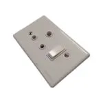 White Plastic Wall Plate Featuring Three Round Sockets and a Small Rocker Switch
