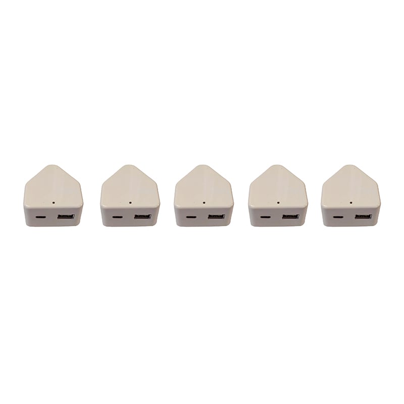 Five White Wedge Shaped Usb Hubs Lined Up in a Row Each with a Usb a Port on the Front